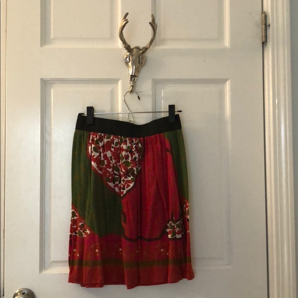Patterned green, gold, red and black skirt